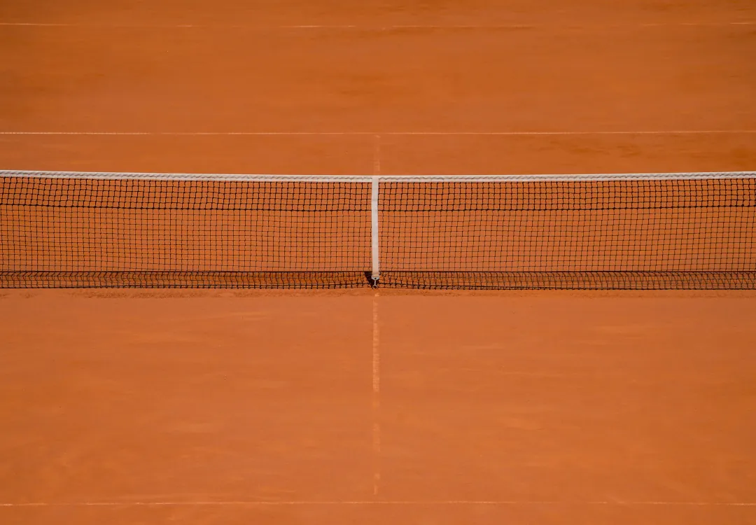 The clay court — net and lines ready for play